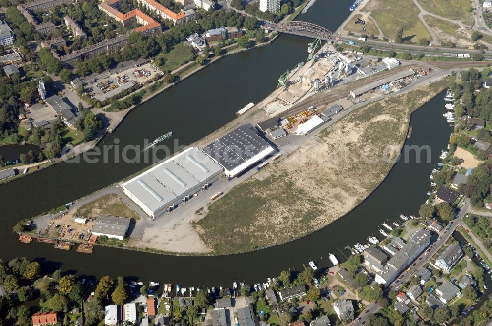 Berlin from above - Wharves and piers with ship loading terminals in the inner harbor Suedhafen on the Havel river in the district Spandau in Berlin, Germany