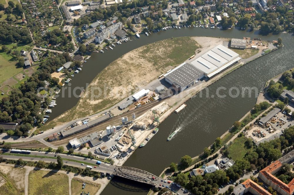 Berlin from the bird's eye view: Wharves and piers with ship loading terminals in the inner harbor Suedhafen on the Havel river in the district Spandau in Berlin, Germany