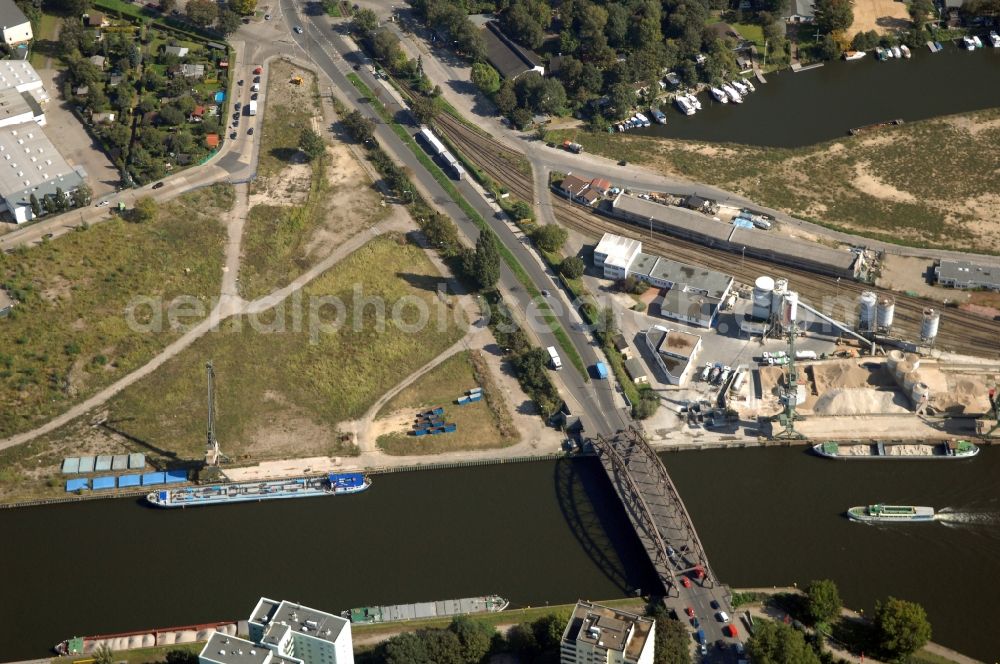 Berlin from above - Wharves and piers with ship loading terminals in the inner harbor Suedhafen on the Havel river in the district Spandau in Berlin, Germany