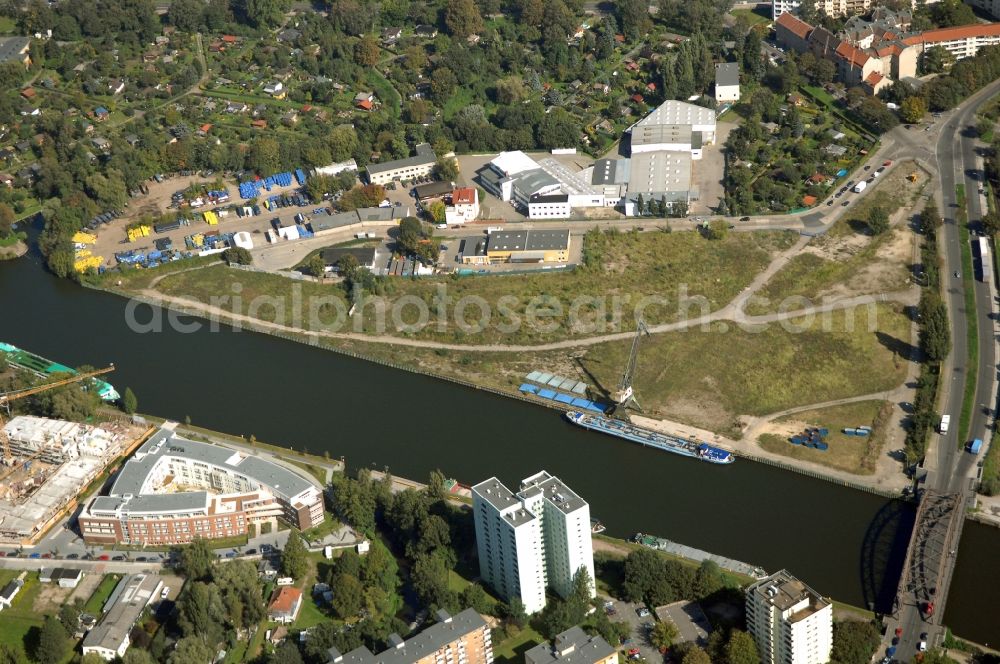 Berlin from the bird's eye view: Wharves and piers with ship loading terminals in the inner harbor Suedhafen on the Havel river in the district Spandau in Berlin, Germany