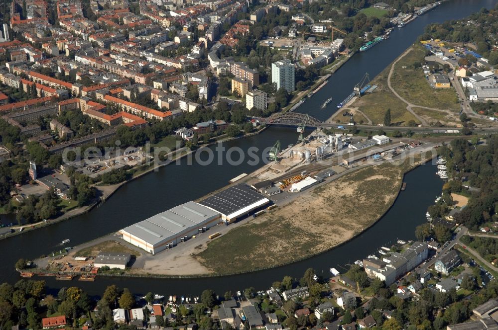 Berlin from above - Wharves and piers with ship loading terminals in the inner harbor Suedhafen on the Havel river in the district Spandau in Berlin, Germany