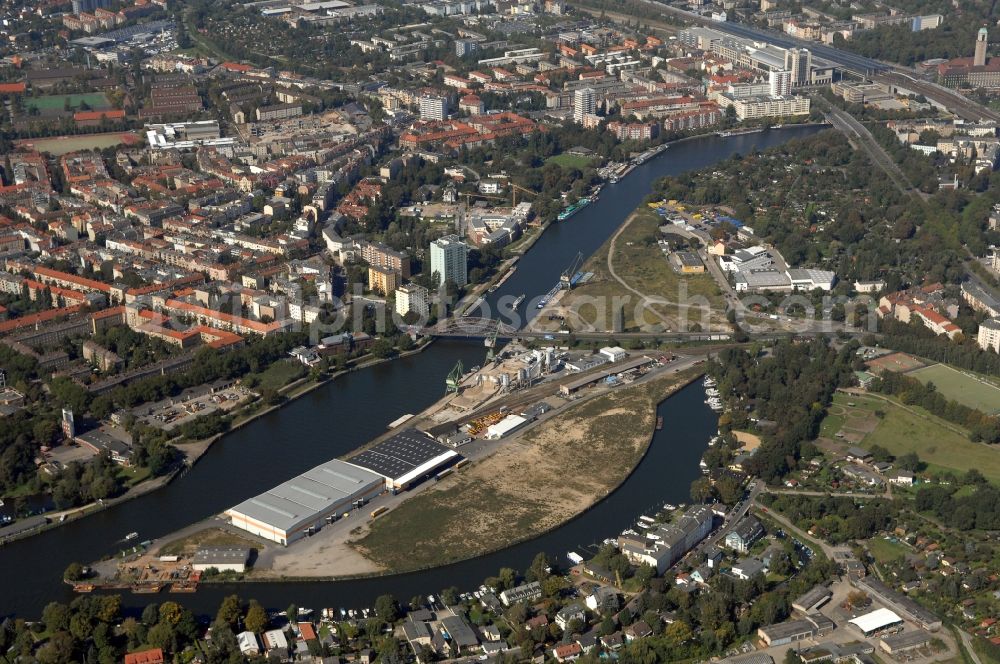 Berlin from the bird's eye view: Wharves and piers with ship loading terminals in the inner harbor Suedhafen on the Havel river in the district Spandau in Berlin, Germany