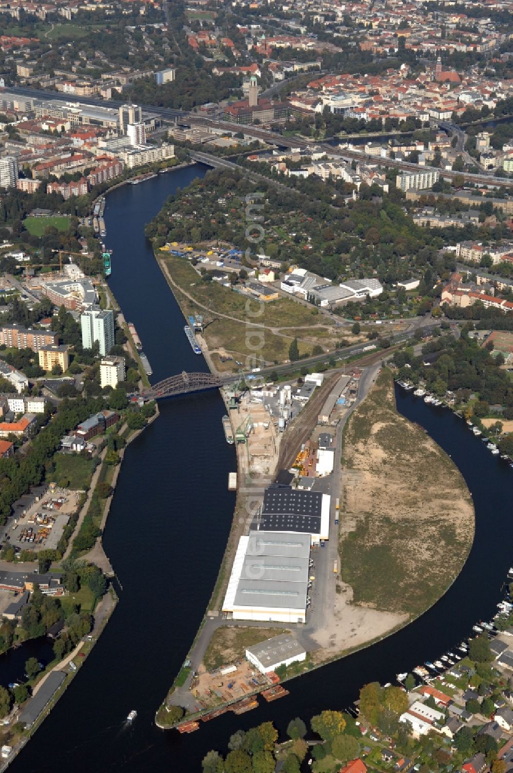 Berlin from above - Wharves and piers with ship loading terminals in the inner harbor Suedhafen on the Havel river in the district Spandau in Berlin, Germany