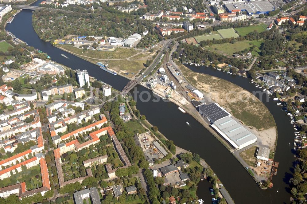 Berlin from above - Wharves and piers with ship loading terminals in the inner harbor Suedhafen on the Havel river in the district Spandau in Berlin, Germany