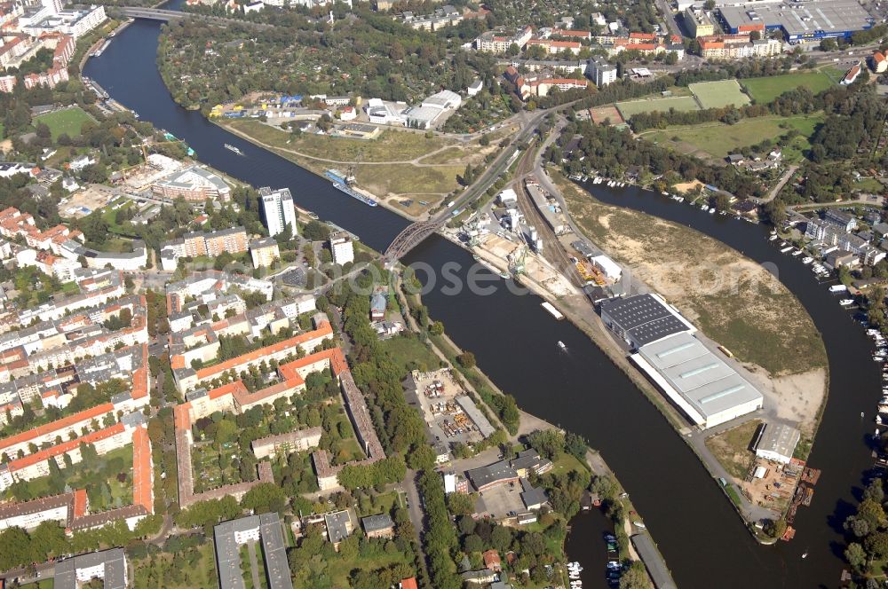 Berlin from the bird's eye view: Wharves and piers with ship loading terminals in the inner harbor Suedhafen on the Havel river in the district Spandau in Berlin, Germany