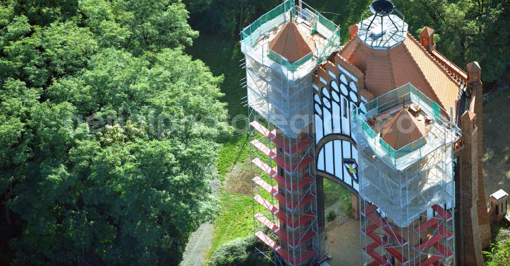 Aerial image Rathenow - Der Bismarckturm steht auf dem Weinberg in Rathenow, Brandenburg. Er wurde zu Ehren Ottos von Bismarck gebaut. Momentan werden die Dächer der Seitentürme renoviert. The Bismarck Tower is situated on the Weinberg Rathenow. It was constructed in honor of Otto von Bismarck. Currently the roofs are going to be restaurated.