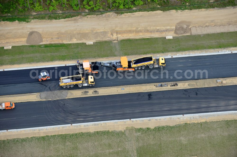 Ludwigslust from the bird's eye view: Bitumen - mixing plant to the driving surface production to the construction site on the traffic flow on the motorway junction of the A14 motorway at exit Ludwigslust in Mecklenburg - Western Pomerania