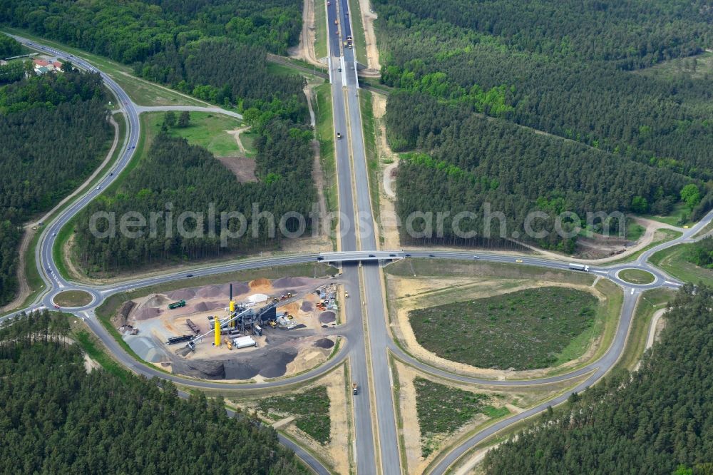 Aerial image Ludwigslust - Bitumen - mixing plant to the driving surface production to the construction site on the traffic flow on the motorway junction of the A14 motorway at exit Ludwigslust in Mecklenburg - Western Pomerania