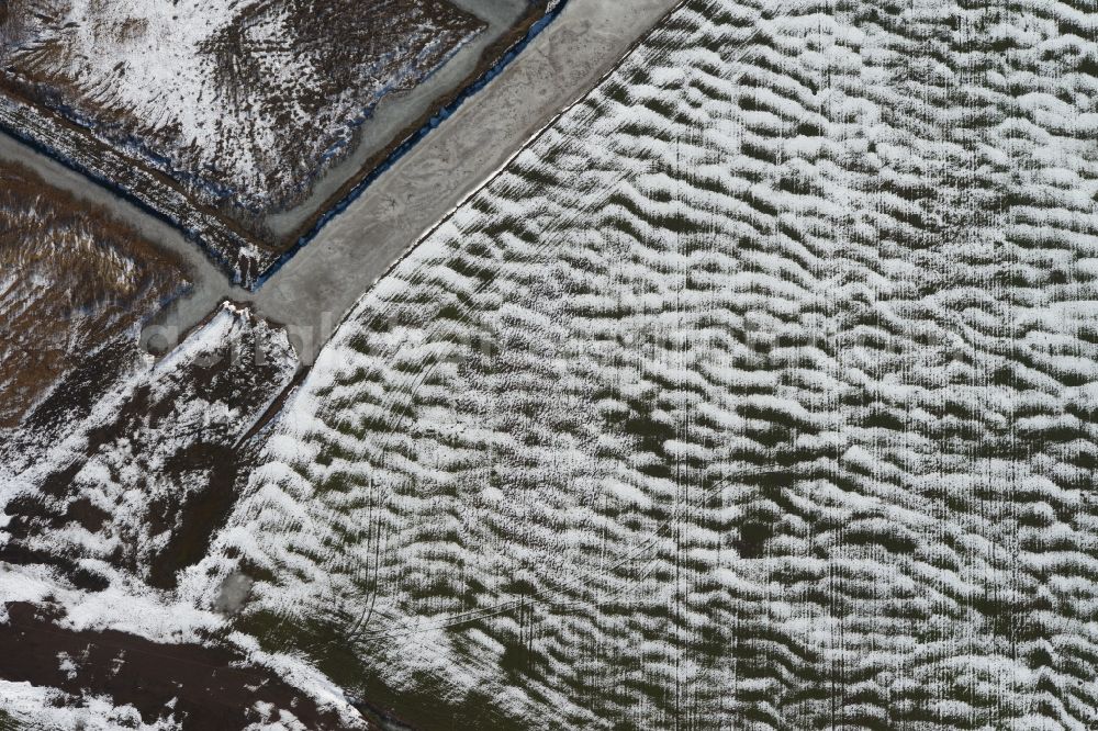 Aerial image Bittstädt - Winter snowy field structures in Bittstaedt in Thuringia