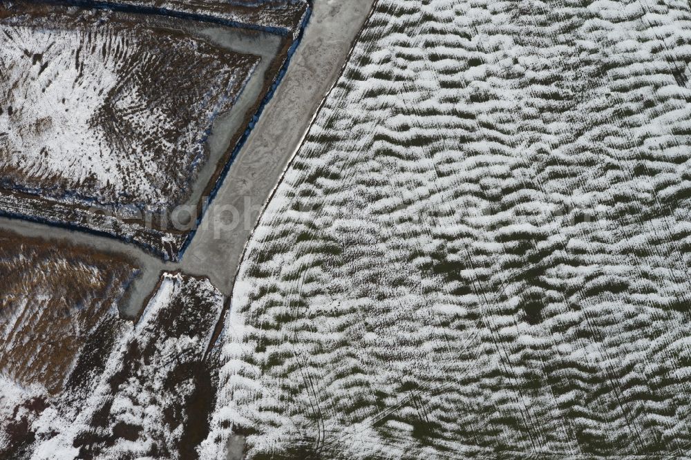 Aerial photograph Bittstädt - Winter snowy field structures in Bittstaedt in Thuringia