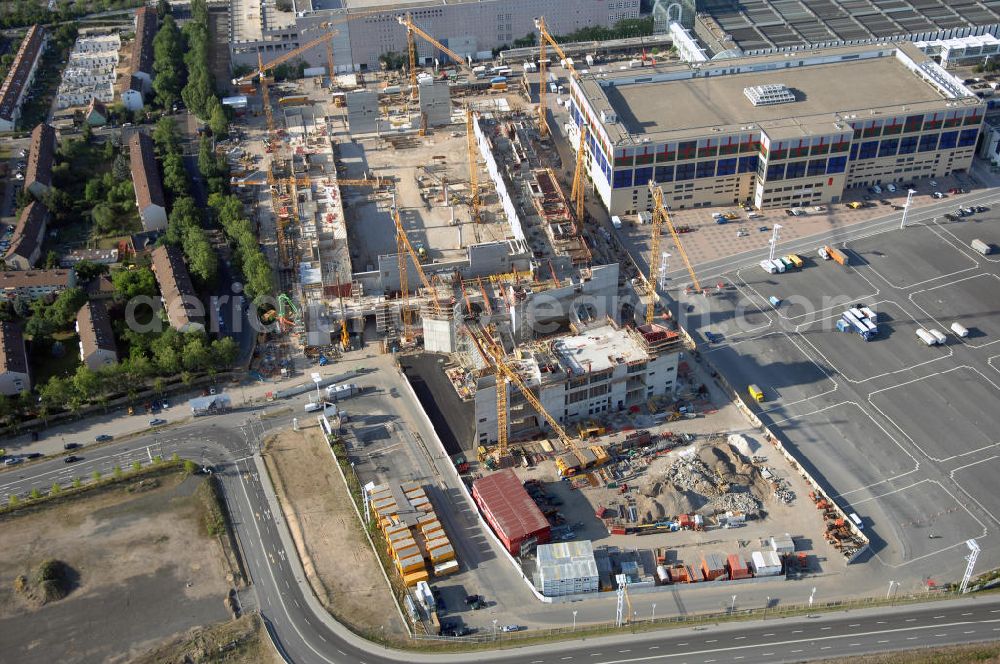 Frankfurt am Main from the bird's eye view: Blick auf das Messe- und Ausstellungsgelände mit Congress- und Festhalle sowie S-Bahnhof Messe. Im Westen des Geländes ensteht zur Zeit die neue Halle 11. Der Bau wird begleitet mit Webcams und Events. Frankfurt ist der drittgrößte Messeplatz der Welt. Adresse: Messe Frankfurt GmbH, Ludwig-Erhard-Anlage 1, 60327 Frankfurt a. M., Tel. +49 (0)69 75 75 0, Fax +49 (0)69 75 75 64 33