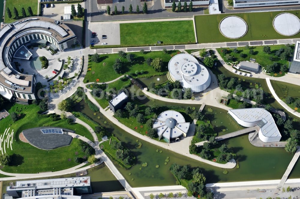 Wolfsburg from the bird's eye view: View of the Autostadt Wolfsburg in Lower Saxony. The facility is a museum and theme park of the Volkswagen AG near the Volkswagen plant. Designed by the office of HENN architects and engineers and operated by the Autostadt GmbH, the park was opened in 2000