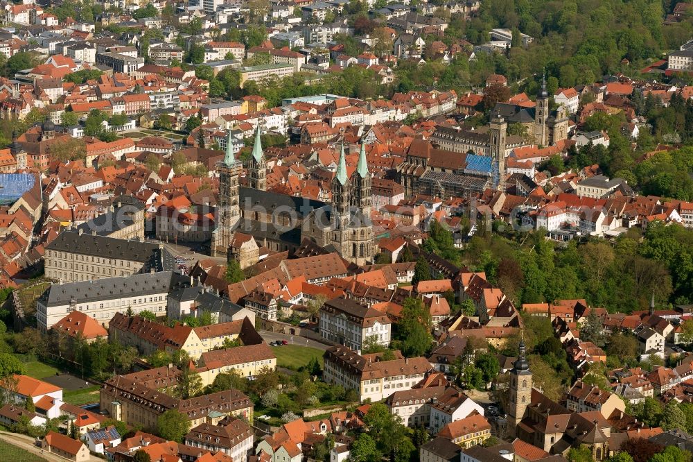 Aerial image Bamberg - View of the Bamberg Cathedral of St. Peter and St. George in the state of Bavaria. The cathedral, which was consecrated in 1012 for the first time, belongs to the German Emperor and cathedrals, and is with its four towers, the dominant building of the World Heritage of Bamberg's Old Town