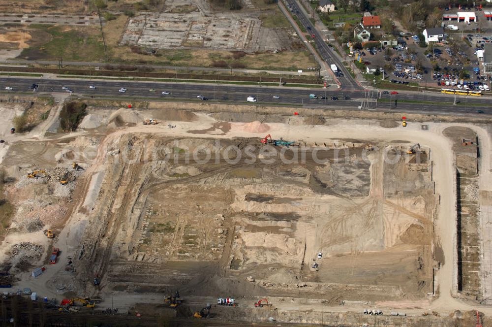 Aerial photograph Berlin - Blick auf das im Bau befindliche IKEA-Einrichtungshaus in Berlin-Lichtenberg. Diese Filiale soll mit 44.000 qm das zweitgrößte Einrichtungshaus des Konzerns werden. Es werden 60 Mio. Euro investiert. Adresse: IKEA Deutschland Verkaufs-GmbH, Am Wan dersmann 2-4. 65719 Hofheim-Wallau, Tel. +49 (0)0180 53534 35, Fax +49 (0)0180 53534 36, Email: ausk@memo.ikea.com