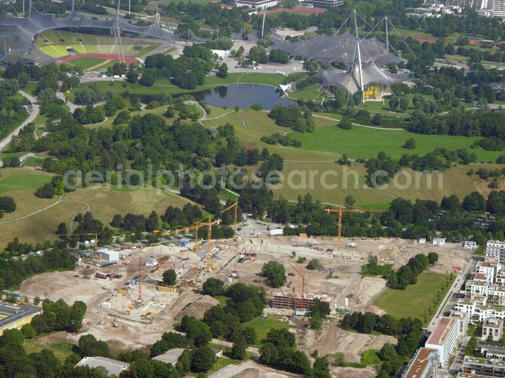 Aerial photograph München / Bayern - Blick auf das Baugelände des Wohngebietes Olympiapark. Bei CONCEPTBAUGOLD leben Sie direkt am Olympiapark! Wohnen Sie in der besten Ausgangslage .Beim Ackermannbogen in Schwabing kommt das Beste zum Schluss: Mit CONCEPTBAUGOLD wird das letzte Grundstück direkt am Olympiapark bebaut. Beratungspavillion vor Ort: Ackermannstr. 49, 80797 München Mo-So 14.00 - 18.00 Uhr Anruf zum Ortstarif: Telefon: 01801. 266 277, Fax: 089.350 949-41, gold@conceptbau.de