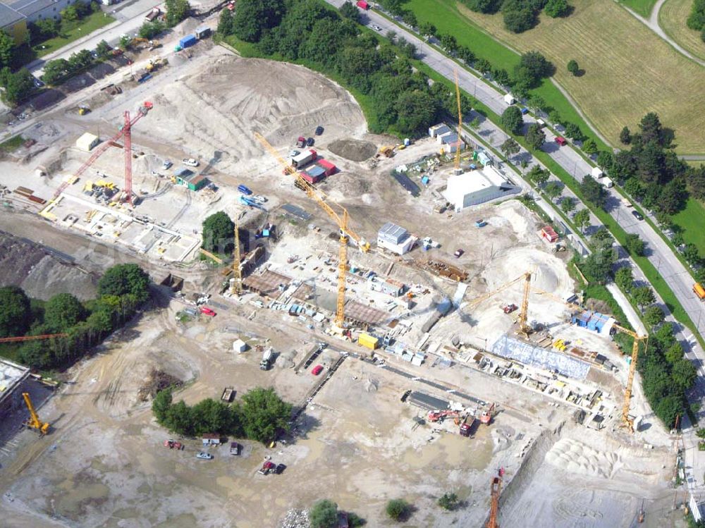 München / Bayern from the bird's eye view: Blick auf das Baugelände des Wohngebietes Olympiapark. Bei CONCEPTBAUGOLD leben Sie direkt am Olympiapark! Wohnen Sie in der besten Ausgangslage .Beim Ackermannbogen in Schwabing kommt das Beste zum Schluss: Mit CONCEPTBAUGOLD wird das letzte Grundstück direkt am Olympiapark bebaut. Beratungspavillion vor Ort: Ackermannstr. 49, 80797 München Mo-So 14.00 - 18.00 Uhr Anruf zum Ortstarif: Telefon: 01801. 266 277, Fax: 089.350 949-41, gold@conceptbau.de