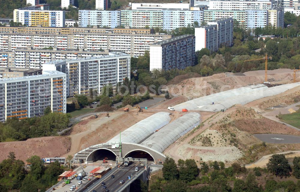 Aerial photograph Jena - Blick auf die Baustelle der Autobahn 4 in Jena Göschwitz. Die Bauarbeiten haben im Jahr 2004 begonnen. Ziel ist der Ausbau zu einer sechsspurigen Autobahn und die Lärmminderung durch die Eintunnelung eines Teilstückes der Autobahn. Außerdem entstand mit 5 Meter Abstand eine zweite Brücke neben der denkmalgeschützten Saalebrücke. Kontakt: Ingenieurgruppe BEB GmbH, Über der Nonnenwiese 7 99428 Weimar, Tel. +49(0)3643 7466 0, Fax +49(0)3643 7466 29, Email: kontakt@beb-weimar.de