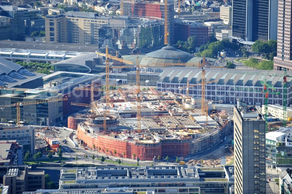 Frankfurt am Main from above - View of the construction site of the shopping center of the complex Skyline Plaza in Frankfurt. The construction began in June 2011, the opening is scheduled for autumn 2013. The building, which will cost € 320 million and have a sales area of 38,000 square kilometers, is designed of the shopping center specialist ECE Group and CA Immo. It is built by the Max Bögl Construction GmbH & Co in cooperation with bam Deutschland. KG. The architects office Jourdan and Müller also plans, in addition to the undulating facade of the five-storey building, Frankfurt's largest beer garden on the roof of the shopping center