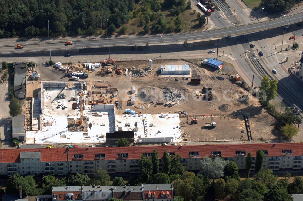 Aerial photograph Berlin - Blick auf eine Baustelle für ein Fachmarktzentrum in Berlin Treptow-Köpenick. Das historische, ehemals industriell genutzte Gelände zwischen Fuststraße, Rummelsburger Straße und Edisonstraße wird bis Februar 2009 bebaut. Es soll ein Nahversorgungszentrum entstehen. Bauherr: GPU + GERMANIA - Projekt Fuststr. GbR, Herr Lutz Lakomski, Burgweg 7, 56428 Dernbach; Bau: HW Hotel- und Wohnbau GmbH, Rizzastr. 51, 56007 Koblenz, Tel. +49(0)261 304460, Fax +49(0)261 15212, Email: post@hw-bau.de