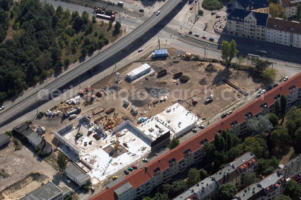 Aerial image Berlin - Blick auf eine Baustelle für ein Fachmarktzentrum in Berlin Treptow-Köpenick. Das historische, ehemals industriell genutzte Gelände zwischen Fuststraße, Rummelsburger Straße und Edisonstraße wird bis Februar 2009 bebaut. Es soll ein Nahversorgungszentrum entstehen. Bauherr: GPU + GERMANIA - Projekt Fuststr. GbR, Herr Lutz Lakomski, Burgweg 7, 56428 Dernbach; Bau: HW Hotel- und Wohnbau GmbH, Rizzastr. 51, 56007 Koblenz, Tel. +49(0)261 304460, Fax +49(0)261 15212, Email: post@hw-bau.de