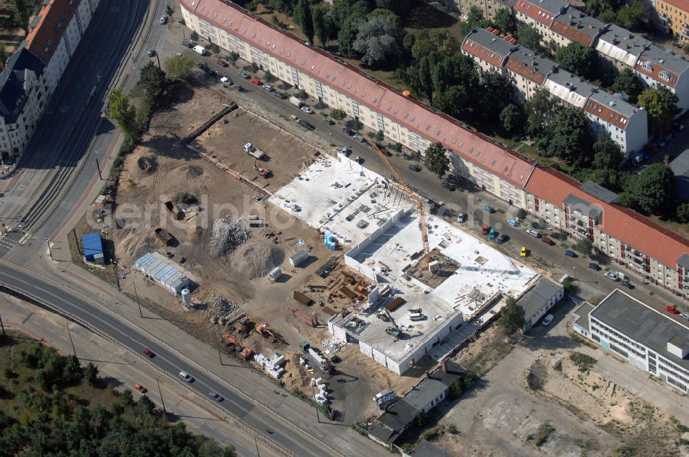 Aerial photograph Berin - Blick auf eine Baustelle für ein Fachmarktzentrum in Berlin Treptow-Köpenick. Das historische, ehemals industriell genutzte Gelände zwischen Fuststraße, Rummelsburger Straße und Edisonstraße wird bis Februar 2009 bebaut. Es soll ein Nahversorgungszentrum entstehen. Bauherr: GPU + GERMANIA - Projekt Fuststr. GbR, Herr Lutz Lakomski, Burgweg 7, 56428 Dernbach; Bau: HW Hotel- und Wohnbau GmbH, Rizzastr. 51, 56007 Koblenz, Tel. +49(0)261 304460, Fax +49(0)261 15212, Email: post@hw-bau.de