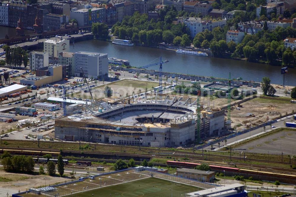 Berlin from the bird's eye view: Blick auf die Baustelle der fast rohbaufertigen zukünftigen O2 World Arena im Berliner Bezirk Kreuzberg/Friedrichshain. Die Multifunktionsarena, die bis zu 17.000 Zuschauer fassen kann, wird auf dem Areal des ehemaligen Ostgüterbahnhofs im Bezirk Kreuzberg-Friedrichshain bis Ende 2008 enstehen.