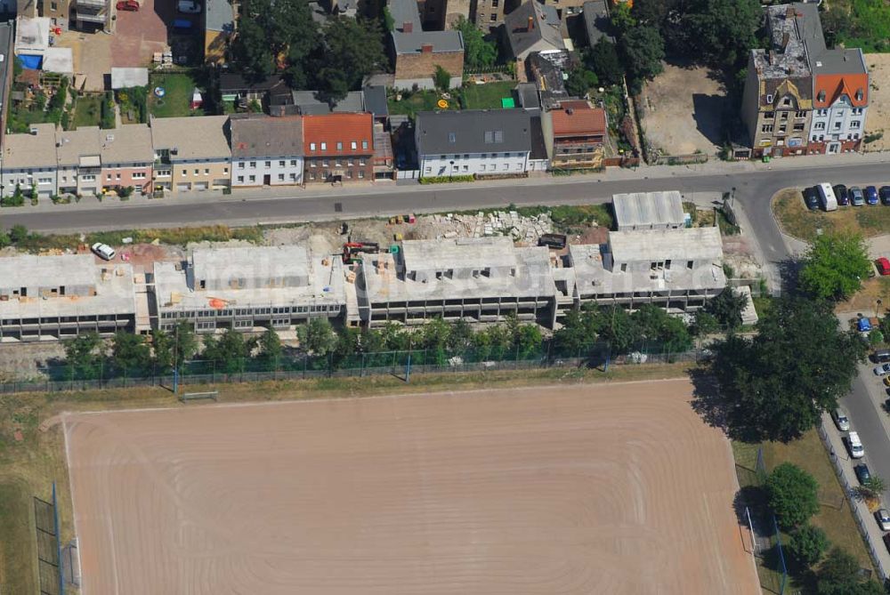 Aerial image Halle/Saale - Blick auf eine Baustelle in Halle. Hier wurde ein Plattenbau bis auf die untersten Etagen abgetragen. Nun wird auf darauf ein neues Wohnhaus erbaut.