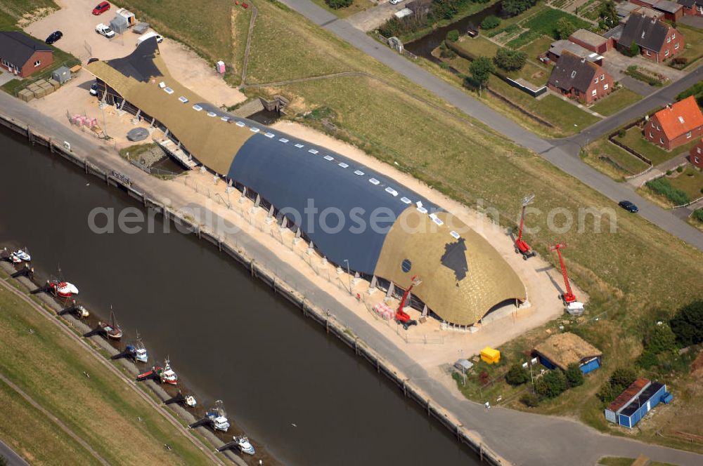 Aerial image Friedrichskoog - Blick auf eine Baustelle für eine Indoor - Spielhalle in Friedrichskoog. DIe Freizeit - Spielhalle in Form eines Wals kostet 3 Mio. Euro. Richtfest war im Mai 2008. Architekt: rimpf Architektur, Rosengang 4, 24340 Eckernförde, Tel. +49 (0)4351 7172 0, Fax +49 (0)4351 7172 73, Email info@rimpf.de