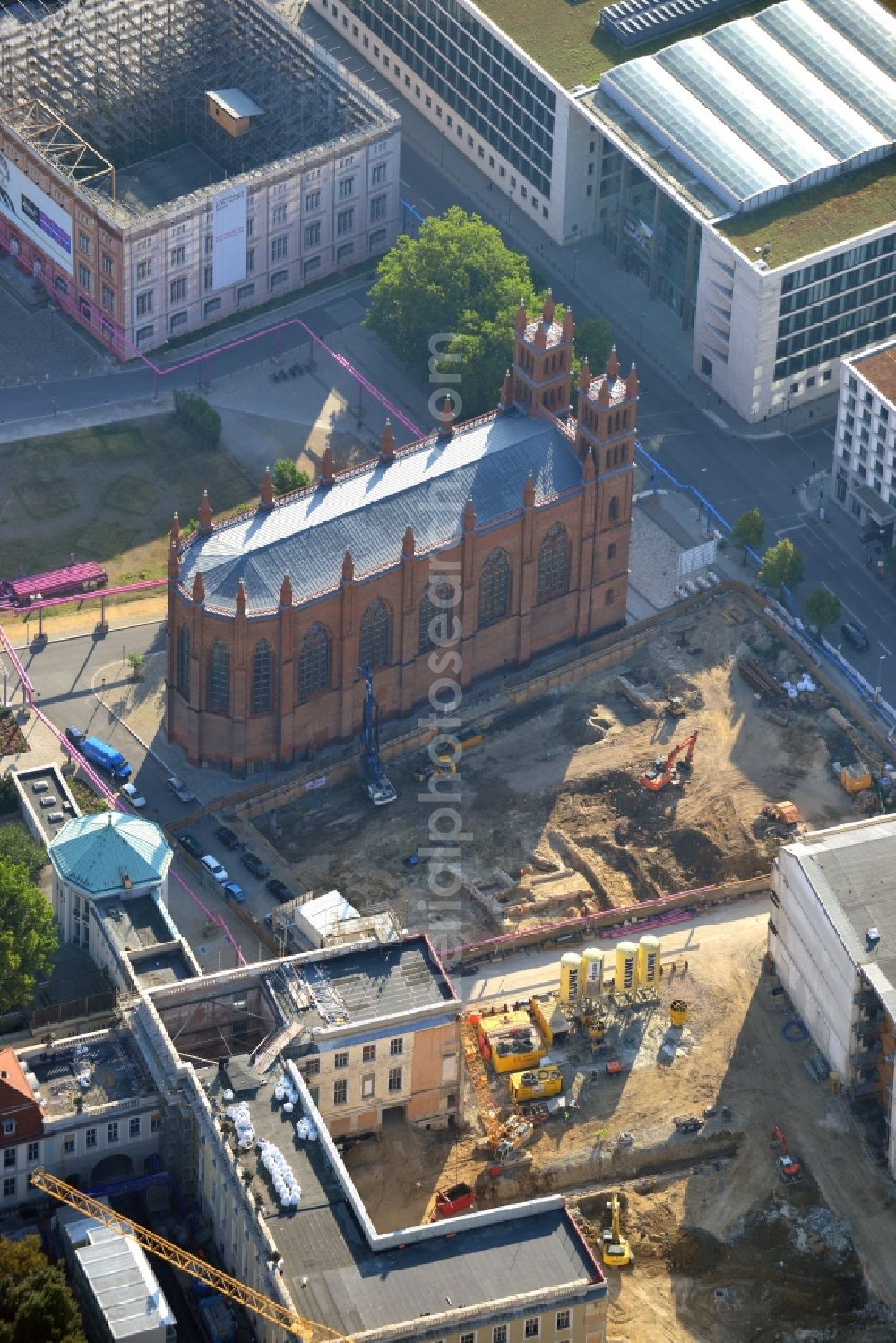 Berlin from the bird's eye view: View of construction site of the Kronprinzengärten in Berlin-Mitte. On the area between the Federal Foreign Office, the Kronprinzenpalais, the Friedrichswerder Church and the Oberwallstreet created an exclusive building complex of luxury apartments. This new project is implemented by the Bauwert Investment Group