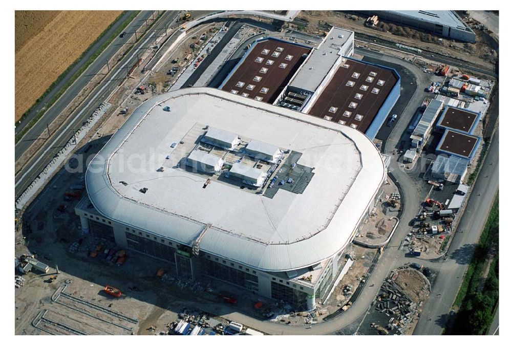 Mannheim / Baden Württemberg from the bird's eye view: Blick auf die Baustelle der Mannheim Arena am Flughafen Mannheim SAP ARENA Betriebsgesellschaft der Multifunktionsarena Mannheim mbH & Co. KG/Verwaltungsstelle Bergheimer Straße 89/1, 69115 Heidelberg Te.:+49 (0) 62 21 - 4 32 06 - 0, Fax.:+49 (0) 62 21 - 4 32 06 - 32 info@saparena.de Anschrift ab September 2005: Xaver-Fuhr-Straße 150, 68163 Mannheim