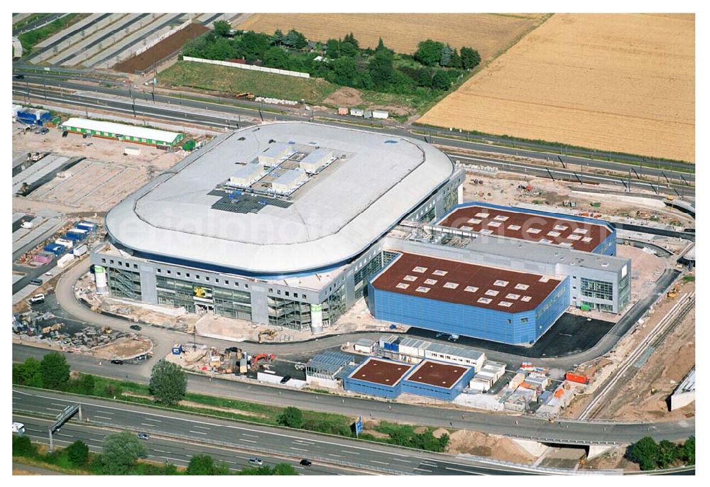 Mannheim / Baden Württemberg from the bird's eye view: Blick auf die Baustelle der Mannheim Arena am Flughafen Mannheim SAP ARENA Betriebsgesellschaft der Multifunktionsarena Mannheim mbH & Co. KG/Verwaltungsstelle Bergheimer Straße 89/1, 69115 Heidelberg Te.:+49 (0) 62 21 - 4 32 06 - 0, Fax.:+49 (0) 62 21 - 4 32 06 - 32 info@saparena.de Anschrift ab September 2005: Xaver-Fuhr-Straße 150, 68163 Mannheim