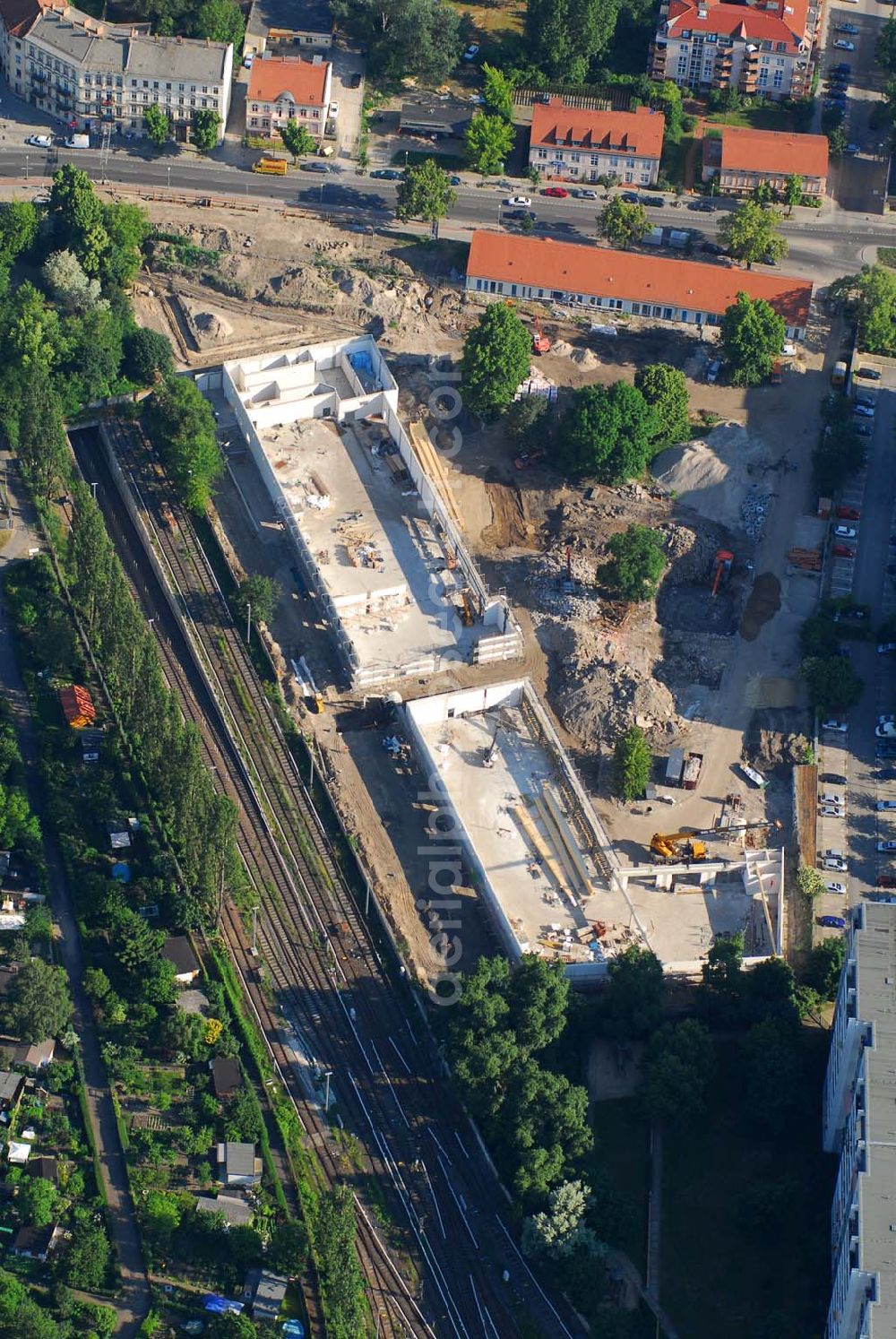 Berlin from the bird's eye view: Blick auf die Baustelle des Market Stadtteilzentrums an der Alfred-Kowalke-Straße in Berlin-Lichtenberg. Beteiligte Firmen: GWB Gesellschaft für Geschäfts- und Wohnbauten mbH und Co. KG, Hauptstr. 1a, 22962 Siek, Tel.: 01407/908061 Bauleitung: PLK Städtebau, Winsstr. 53, 10405 Berlin, Tel.: 030/39071460 Baufirma: STRABAG Hoch- und Ingenieurbau AG, Bessemer Str. 42b, 12103 Berlin, Dipl.-Ing. Peter Dörges, Tel.: +49 (0)30 / 754 77-0, eMail: peter.doerges@strabag.de