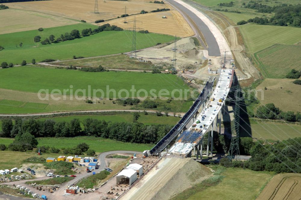 Aerial photograph Ettenhausen - Blick auf die Baustelle der neuen Nessetalbrücke mit einer Länge von 380 m. Die Brücke ist Teil des Projekt Nordverlegung / Umfahrung Hörselberge der Autobahn E40 / A4 in Thüringen bei Eisenach. Durchgeführt werden die im Zuge dieses Projektes notwendigen Arbeiten unter an derem von den Mitarbeitern der Niederlassung Weimar der EUROVIA Verkehrsbau Union sowie der Niederlassungen Abbruch und Erdbau, Betonstraßenbau, Ingenieurbau und TECO Schallschutz der EUROVIA Beton sowie der DEGES.