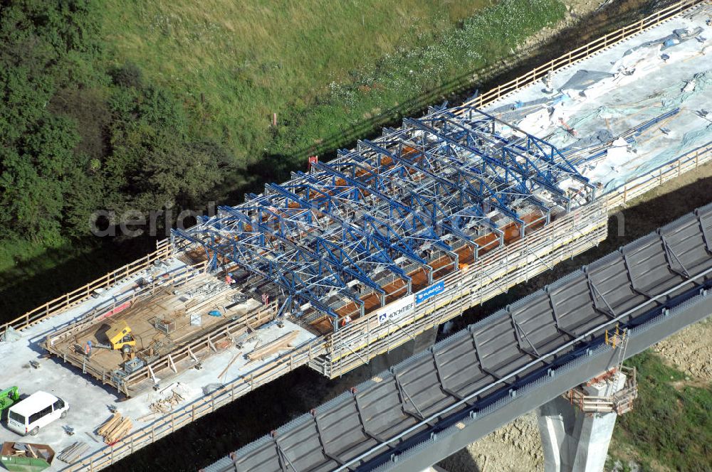 Aerial photograph Ettenhausen - Blick auf die Baustelle der neuen Nessetalbrücke mit einer Länge von 380 m. Die Brücke ist Teil des Projekt Nordverlegung / Umfahrung Hörselberge der Autobahn E40 / A4 in Thüringen bei Eisenach. Durchgeführt werden die im Zuge dieses Projektes notwendigen Arbeiten unter an derem von den Mitarbeitern der Niederlassung Weimar der EUROVIA Verkehrsbau Union sowie der Niederlassungen Abbruch und Erdbau, Betonstraßenbau, Ingenieurbau und TECO Schallschutz der EUROVIA Beton sowie der DEGES.