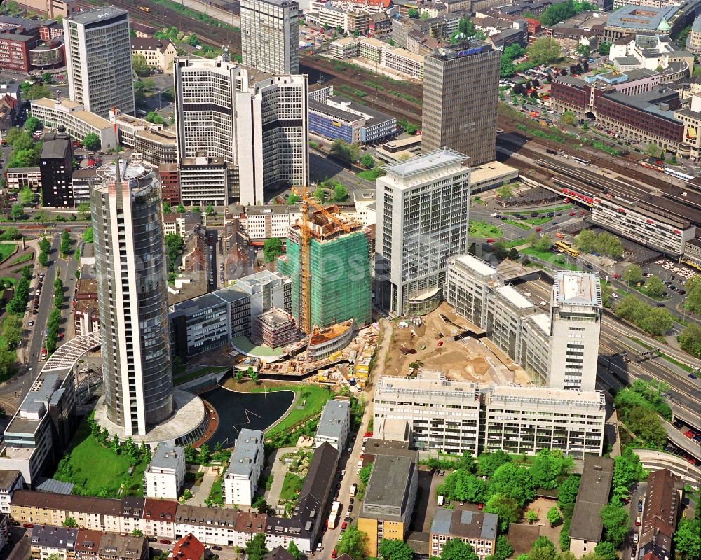 Essen from the bird's eye view: View at the construction site of the RWE headquarters in Essen in the federal statze of North Rhine-Westphalia. The RWE Tower is with 120 meters and up to 500 workplaces the headquarter of the energy supplier RWE. The tower is designed ecological and gains energy from natural daylight and solar heat