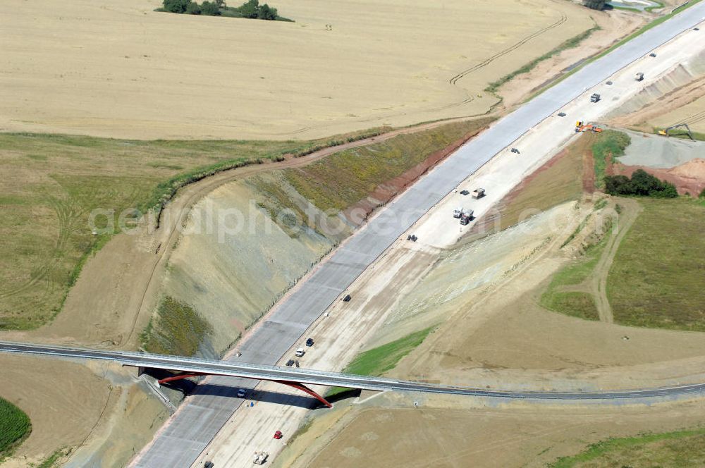 Aerial photograph Madelungen - Blick auf die Baustelle der Strassenbrücke zwischen Stregda und Madelungen welche über die A4 führt. Der Neubau ist Teil des Projekt Nordverlegung / Umfahrung Hörselberge der Autobahn E40 / A4 in Thüringen bei Eisenach. Durchgeführt werden die im Zuge dieses Projektes notwendigen Arbeiten unter an derem von den Mitarbeitern der Niederlassung Weimar der EUROVIA Verkehrsbau Union sowie der Niederlassungen Abbruch und Erdbau, Betonstraßenbau, Ingenieurbau und TECO Schallschutz der EUROVIA Beton sowie der DEGES.