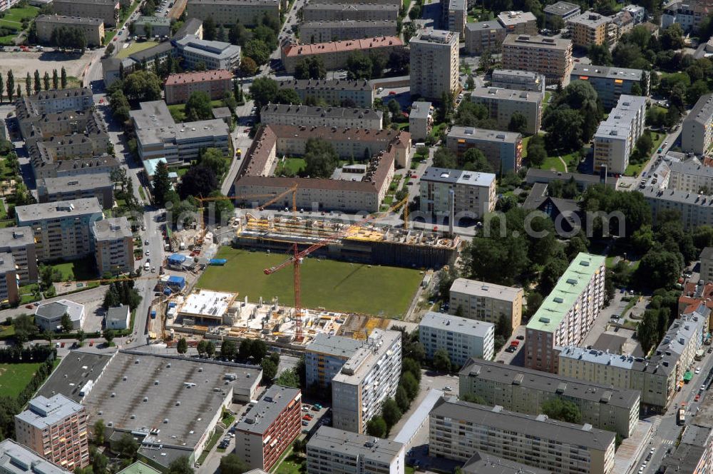 Aerial image Salzburg - Blick auf die Baustelle vom Umbau Lehener Stadion / Stadion Areal zum Wohn- und Geschäftshaus. Das Projekt Neue Mitte Lehen soll künftig die Stadtbibliothek, Wohnungen, Geschäfte und eine Seniorentagesstätte beherbergen. Kontakt Architekt: HALLE 1 Architekturbüro Dipl.Ing. Gerhard Sailer & Dipl.Ing. Heinz Lang, A-5020 Salzburg, Innsbrucker Bundesstrasse 71, Tel. +43 662 833414, Fax +43 662 833414-50, E-Mail:architektur@halle1.at,