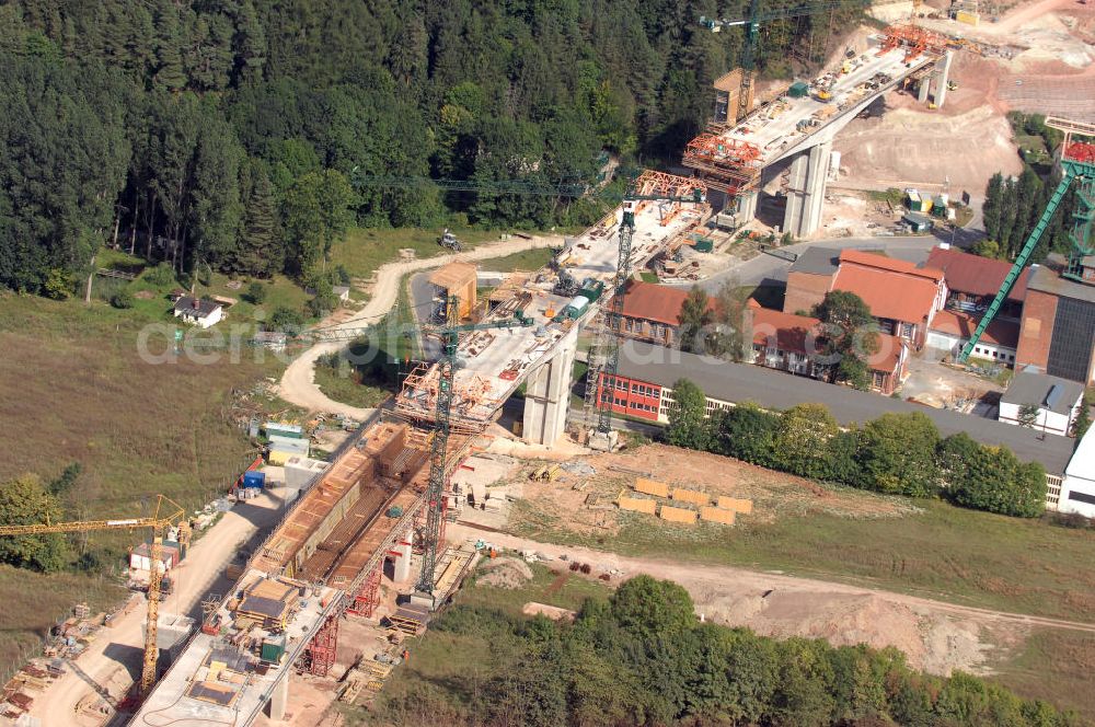 Sollstedt from the bird's eye view: Blick auf die Baustelle zur Bundesautobahn A38 bei Sollstedt. Momentan wird u. a. bei Sollstedt die Bundesautobahn A38 gebaut. Sie ist eines der Verkehrsprojekte Deutsche Einheit und soll eine Verbindung von Halle/Leipzig zum Ruhrgebiet herstellen. Hierbei durchläuft sie die Bundesländer Niedersachsen, Hessen, Thüringen, Sachsen-Anhalt sowie Sachsen. Die Gesamtlänge der Autobahn beläuft sich auf 208 km. Kontakt: DEGES Deutsche Einheit Fernstraßenplanungs- und -bau GmbH, Öffentlichkeitsarbeit, Zimmerstraße 54, 10117 Berlin, Tel.: +49(0)30 202 43 352, Fax: 030-202 43 591, E-Mail: info@deges.de