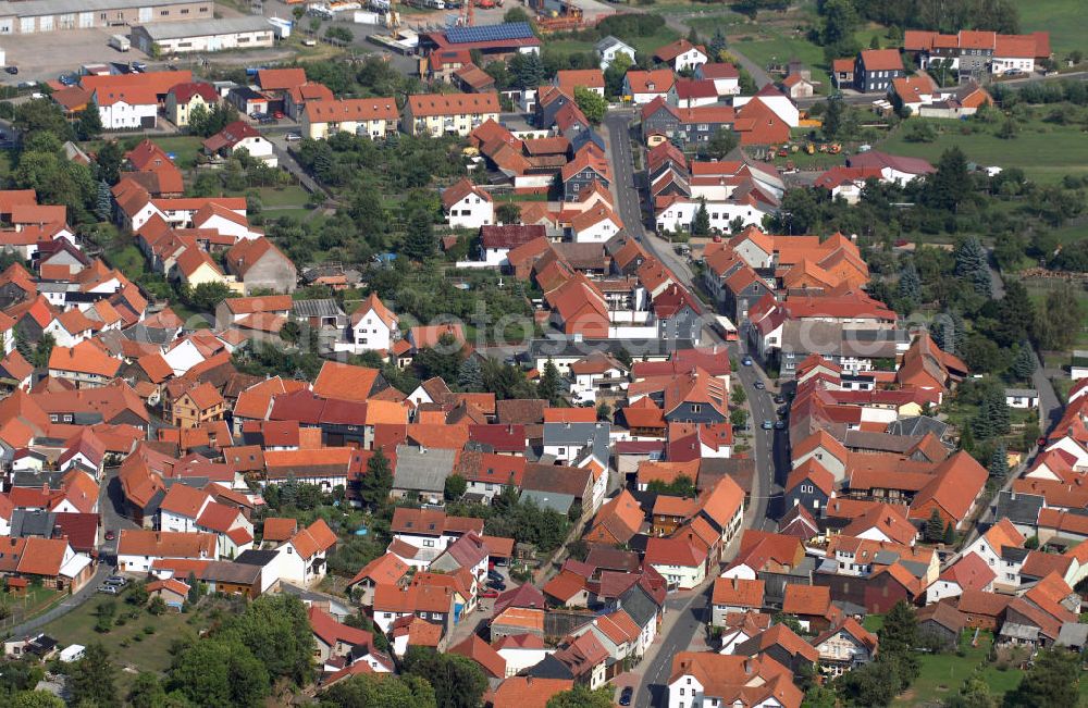 Aerial image Wölfis - Blick auf das Dorf Wölfis. Es gehört zur Gemeinde Ohrdruf im Landkreis Gotha in Thüringen. Ursprünglich war das Dorf reines Agrargebiet, viel Industrie gibt es auch heute nicht. Wölfis ist vor allem wegen seiner Blasmusik bekannt und hat daher den Namen singendes klingendes Dorf.