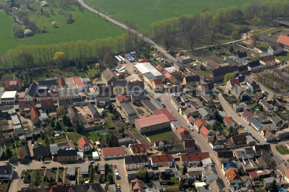 Aerial image Unseburg - Blick über Unseburg im Salzlandkreis. Der Ort liegt ca. 25 km südwestlich von Magdeburg, am Nordrand des Harzes, an der Bode. Das erste Mal urkundlich erwähnt wurde der Ort 939, heute hat er etwa 1.243 Einwohner. Zu den Besonderheiten des Ortes zählt die Kirche, deren Turm aus dem 12.Jh. stammt. PLZ 39435