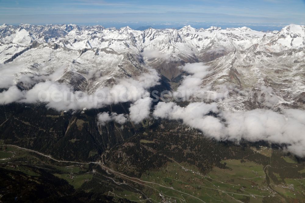 Somvix from above - Snow coveres summits and rocky and mountainous landscape in the Swiss Alps near Somvix in the canton Grisons, Switzerland