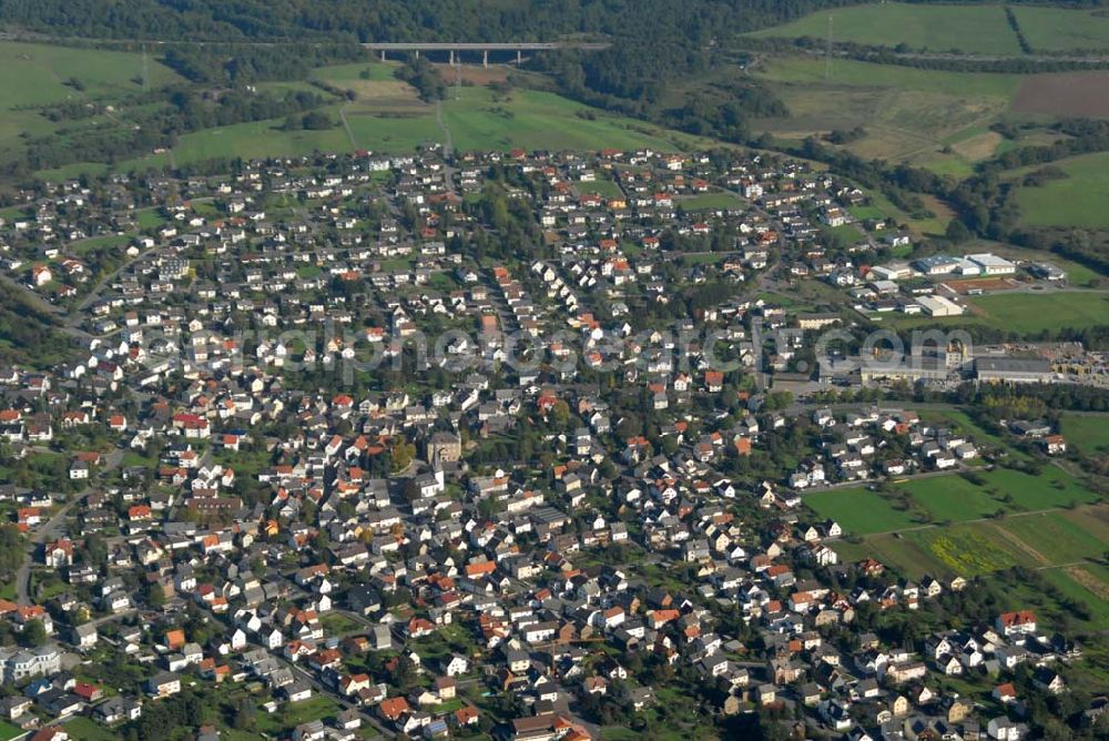 Aßlar from the bird's eye view: Berghausen ist ein Stadtteil der Stadt Aßlar nahe Wetzlar im Lahn-Dill-Kreis in Hessen. Es liegt auf einem Ausläufer des Gebirges Westerwald sowie nahe dem Fluss Dill, der im nahen Wetzlar in die Lahn mündet