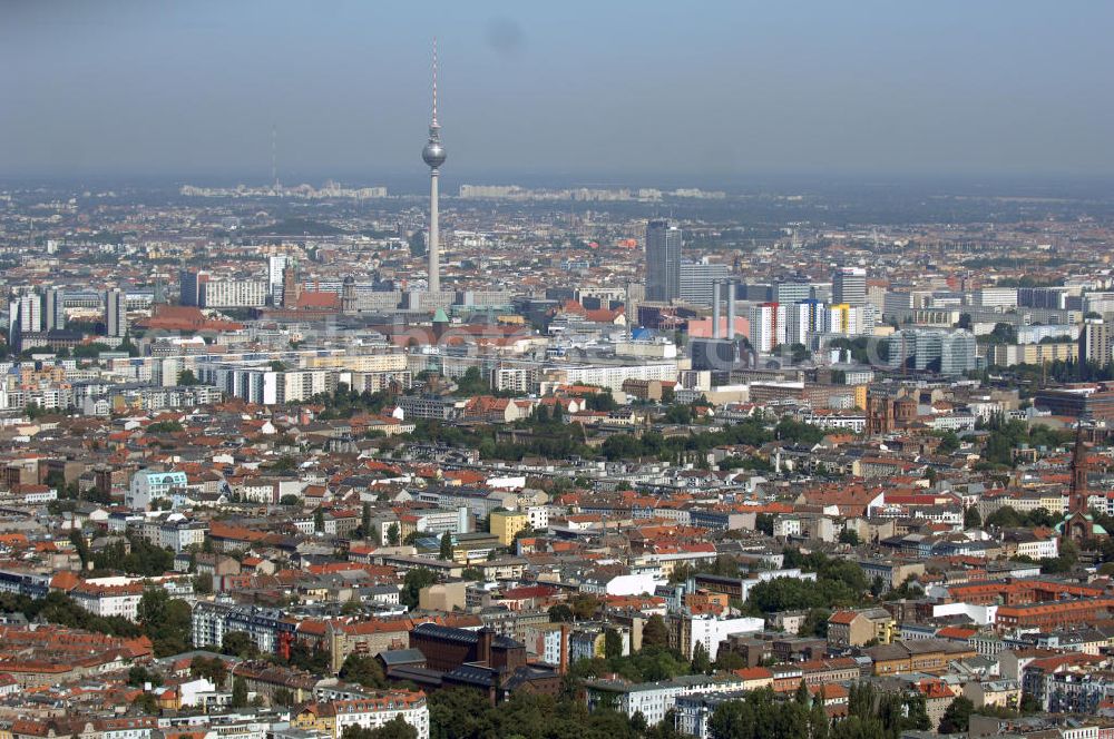 Berlin from above - Blick auf das Berliner Stadtzentrum am Berliner Fernsehturm mit dem Hotelhochhaus park inn am Alexanderplatz und dem Wohngebiet an der Leipziger Strasse mit dem Axel-Springer-Verlag.