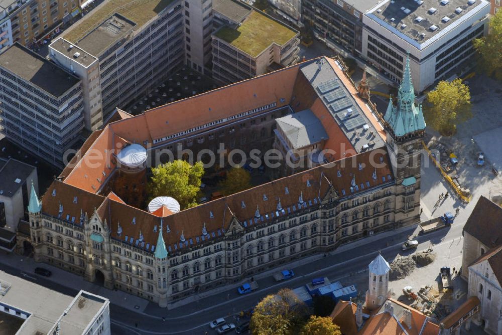 Aerial image Braunschweig - Blick auf das Rathaus in Braunschweig, das zwischen 1894 und 1900 errichtet wurde. Direkt gegenüber befindet sich der Braunschweiger Dom, von dem unten rechts im Bild noch ein Stück zu sehen ist. Kontakt: Stadt Braunschweig, Platz der Deutschen Einheit 1 38100 Braunschweig, Tel. +49(0)531 470 1, Fax +49(0)531 151 12, Email: stadt@braunschweig.de