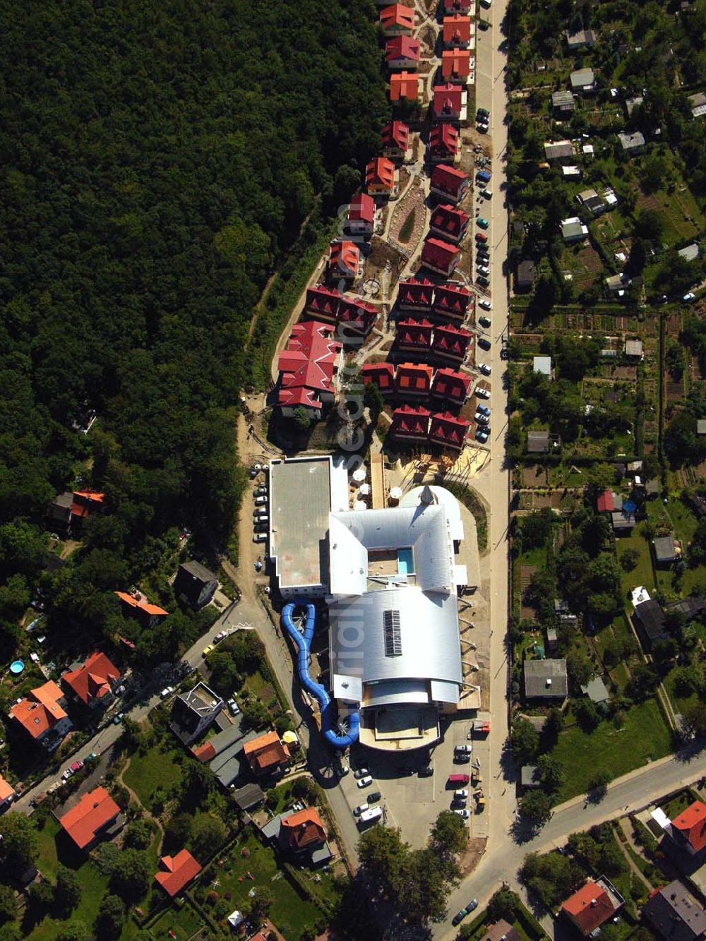 Aerial photograph Wernigerode - 29.08.2005 Wernigerode, Nesseltal 11,38855 Wernigerode, Der HASSERÖDER FERIENPARK im Ortsteil Hasserode, der nahtlos in die Stadt Wernigerode übergeht, eröffnete im Frühjahr 2005. Das Brockenbad im Hasseröder Ferienpark hat alles, was ein Erlebnisbad erst richtig spannend und entspannend macht.