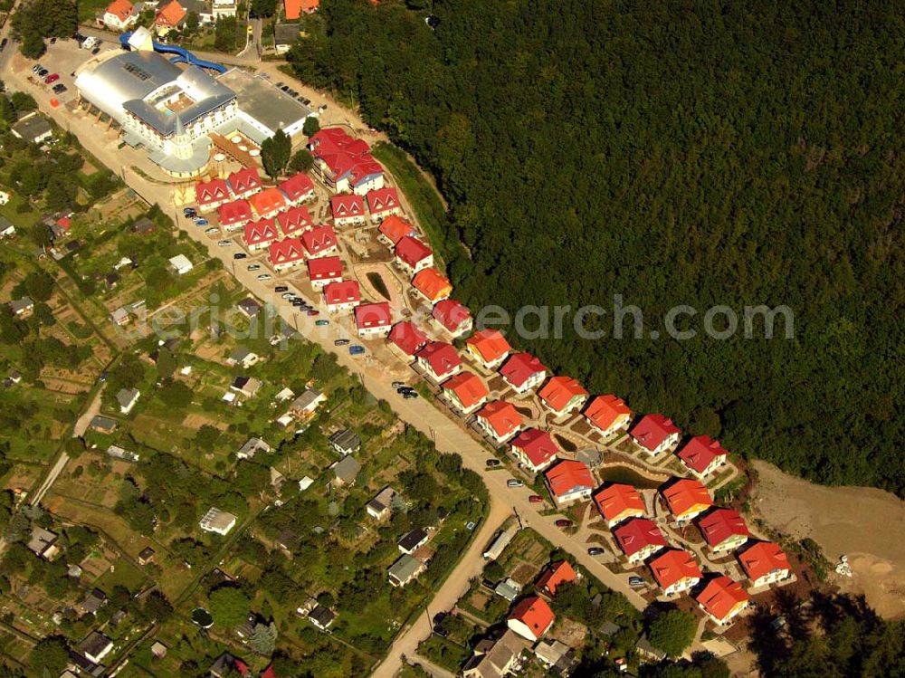 Aerial image Wernigerode - 29.08.2005 Wernigerode, Nesseltal 11,38855 Wernigerode, Der HASSERÖDER FERIENPARK im Ortsteil Hasserode, der nahtlos in die Stadt Wernigerode übergeht, eröffnete im Frühjahr 2005. Das Brockenbad im Hasseröder Ferienpark hat alles, was ein Erlebnisbad erst richtig spannend und entspannend macht.