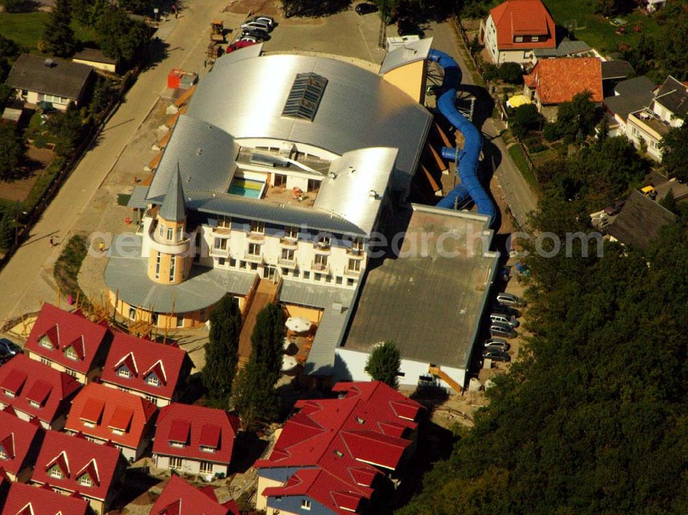 Aerial photograph Wernigerode - 29.08.2005 Wernigerode, Nesseltal 11,38855 Wernigerode, Der HASSERÖDER FERIENPARK im Ortsteil Hasserode, der nahtlos in die Stadt Wernigerode übergeht, eröffnete im Frühjahr 2005. Das Brockenbad im Hasseröder Ferienpark hat alles, was ein Erlebnisbad erst richtig spannend und entspannend macht.