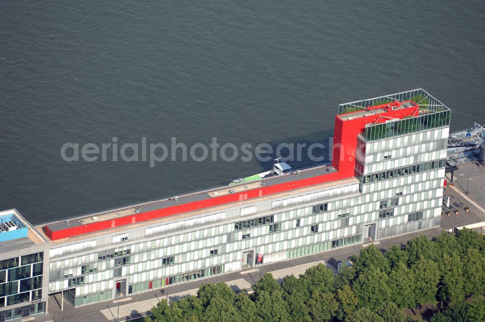 Köln from the bird's eye view: Blick auf das Bürogebäude Kap am Südkai auf der Rheinauhalbinsel in Köln. Auf Grund der schönen Lage direkt am Rhein in der Kölner Innenstadt, sind die Büroräume sehr beliebt und so gut wie vergriffen. Kontakt Kap am Südkai: Agrippinawerft 30 50678 Köln Rheinauhafen, Tel. +49(0)221 35683333, Email: welcome@kapamsuedkai.de