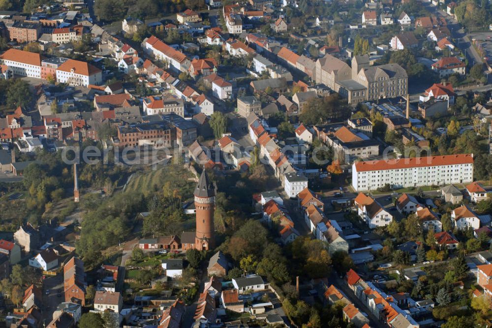 Aerial photograph - Blick auf die Kreisstadt Burg bei Magdeburg im Jerichower Land in Sachsen-Anhalt. Burg gilt auch als Stadt der Türme, da sie früh mit Befestigungsanlagen ausgestattet wurde. Bis heute sind einige von ihnen erhalten geblieben, vor allem aber die Türme. Hier im Bild der Wasserturm von 1902 in Burg. Kontakt: Bernhard Ruth Stadtverwaltung Burg, In der Alten Kaserne 2 39288 Burg, Tel. +49(0)3921 921 202, Email: bernhard.ruth@stadt-burg.de; Kersten Schumacher Stadtverwaltung Burg, In der Alten Kaserne 2 39288 Burg, Tel. +49(0)3921 921 604, Email: kersten.schumacher@stadt-burg.de; Bürgerbüro Anett Primas, Markt 1 39288 Burg, Tel. +49(0)3921 484490, Email: burginfo@stadt-burg.de