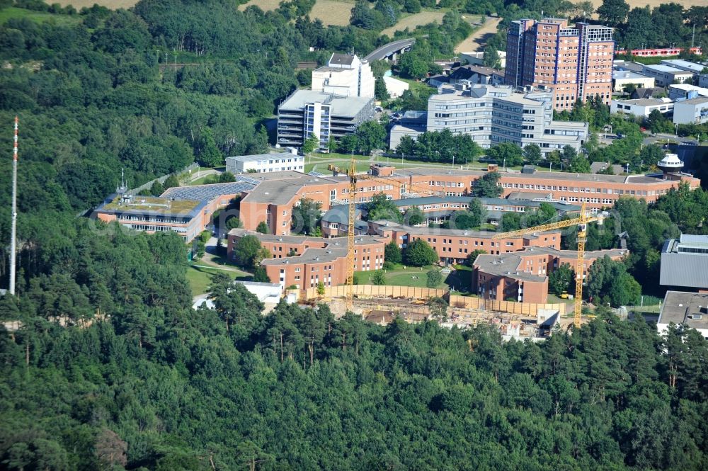 Aerial image Langen - View of the campus of the German Air Traffic Control as well as the Paul Ehrlich Institute in Langen in Hesse. The German Air Traffic Control (DFS) is the civil aviation administration of federal, led by the Federal Ministry of Transport, Building and Urban Development (BMVBS). DFS is currently building a technology center, which was designed by the architectural firm Brown Volleth and is scheduled for late 2014. The Paul-Ehrlich-Institut is the Federal Institute for Vaccines and biomedical drug